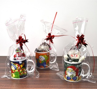 Weihnachtstasse mit Pl&uuml;sch-Schneemann Geschenkset